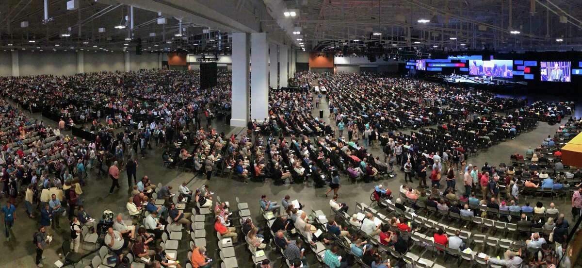 FILE - In this Wednesday, June 16, 2021, file photo, people attend the morning session of the Southern Baptist Convention annual meeting in Nashville, Tenn. At the national SBC gathering in June, thousands of delegates sent the message that they did not want the Executive Committee to oversee an investigation of its own actions on how it handled sexual abuse allegations. (AP Photo/Mark Humphrey, File)