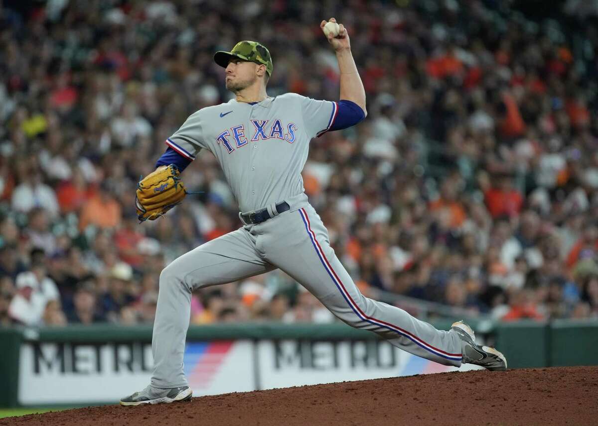 Texas Rangers relief pitcher Brett Martin (59) pitches during the fifth inning of an MLB game Sunday, May 22, 2022, at Minute Maid Park in Houston.