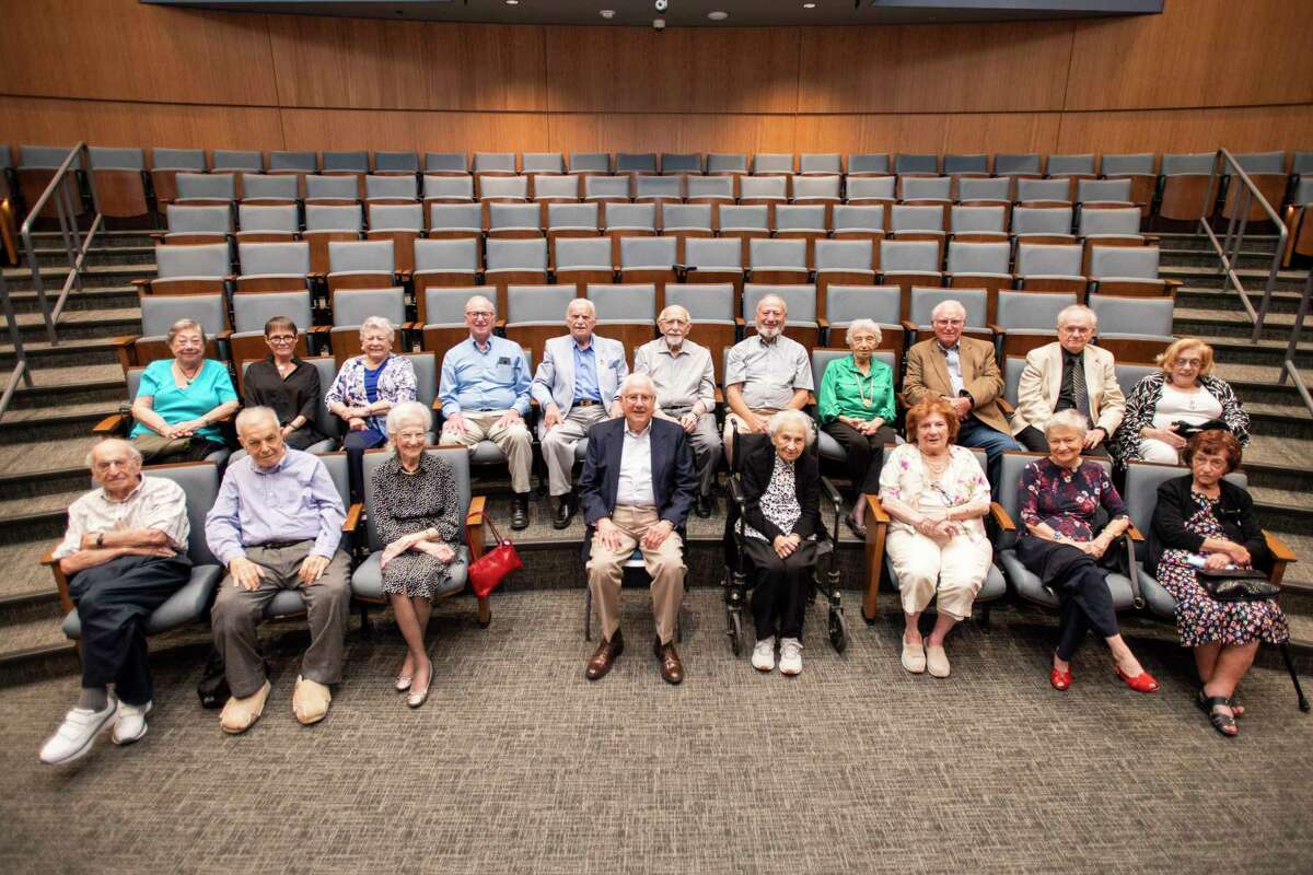 Houston-based Holocaust survivors sit for a group photo during an event held to recognize survivors and their families at the Holocaust Museum Houston.