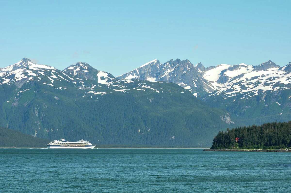 A Celebrity cruise ship sails along the Alaskan coast. A Houston woman is missing and presumed dead after she fell from a Celebrity ship near Juneau, Alaska, on May 17, 2022.