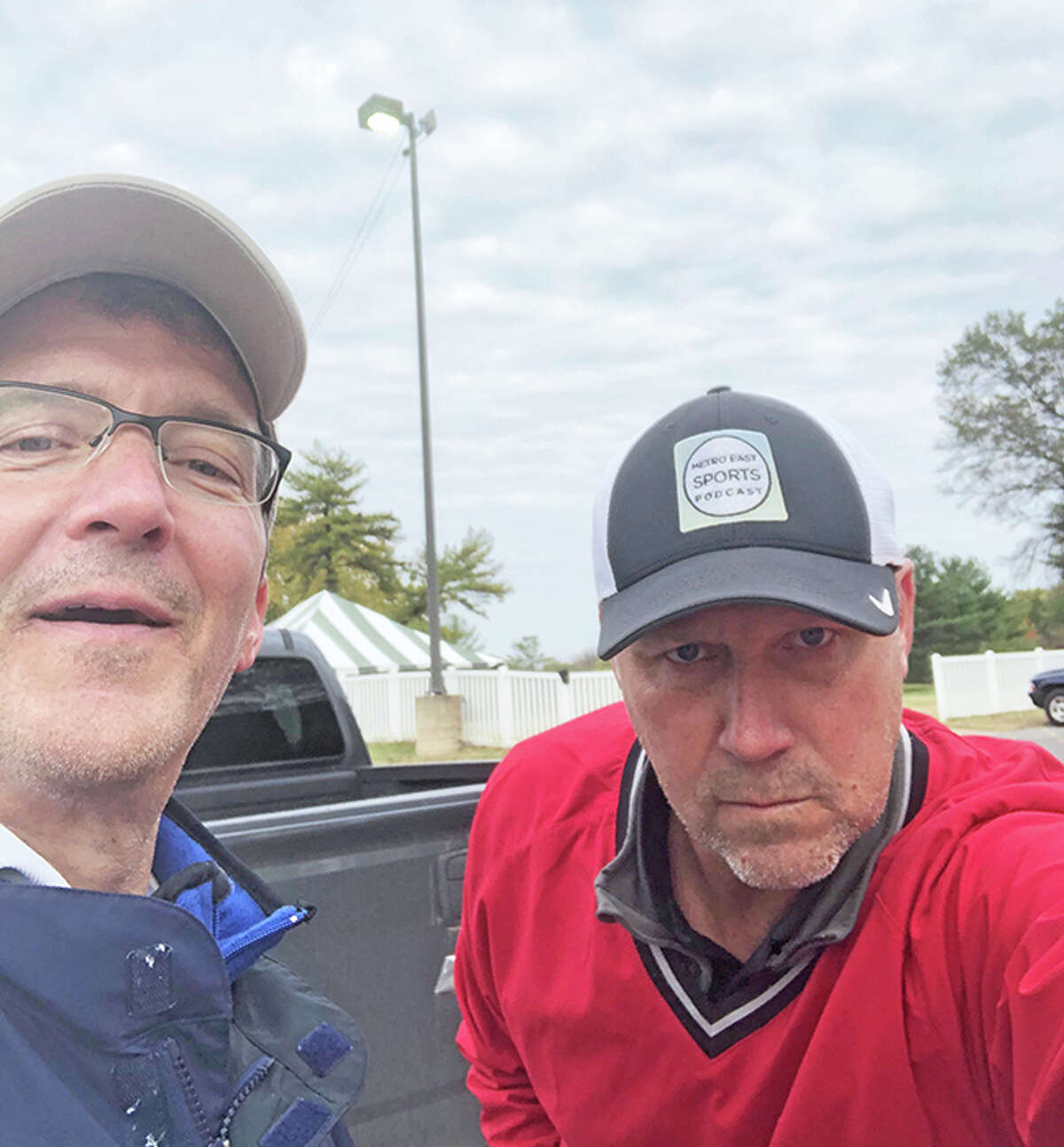 Former Edwardsville tennis and hockey assistant coach Todd Minichiello, left, with EHS tennis coach Dave Lipe.
