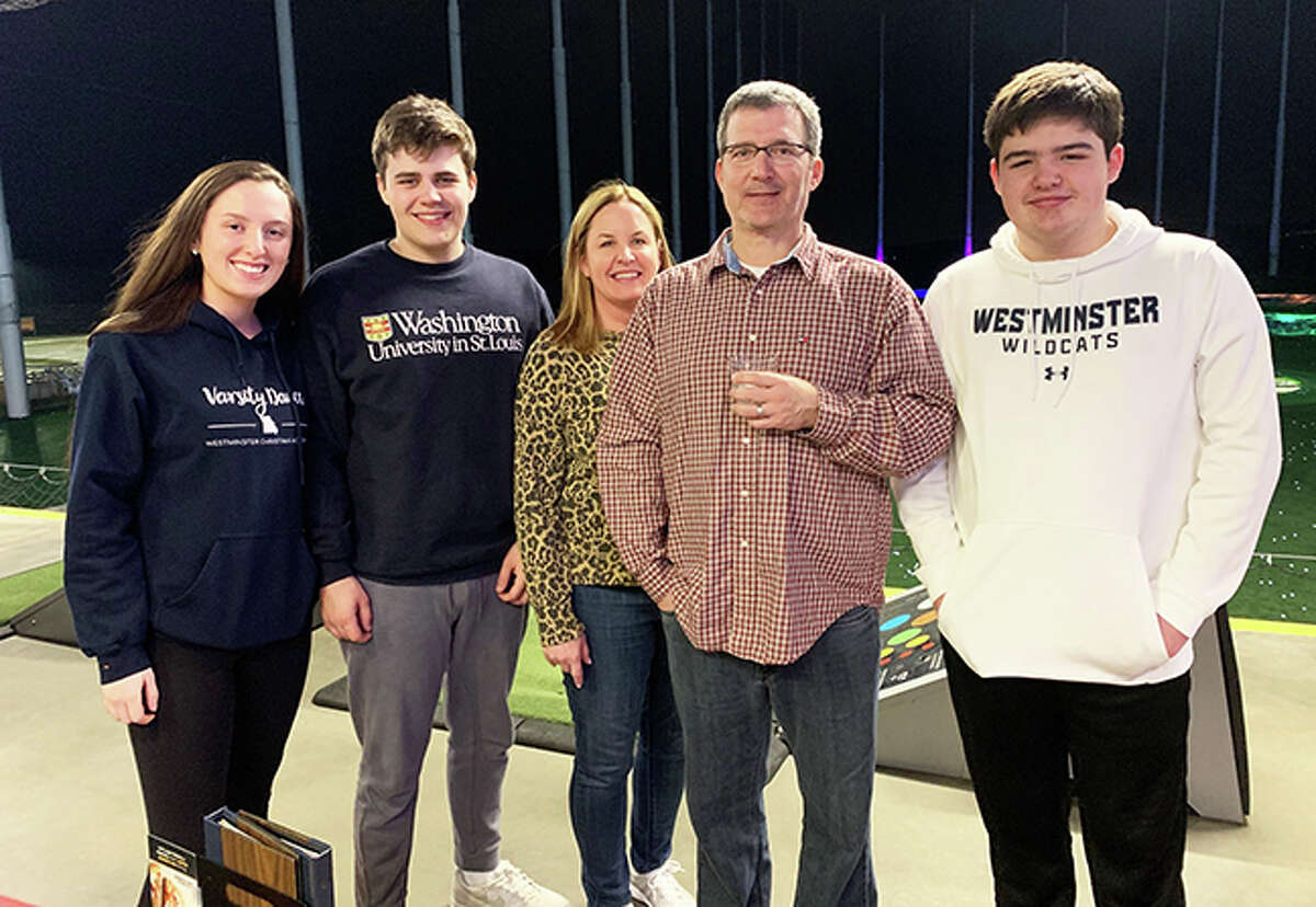 Former Edwardsville tennis and hockey assistant coach Todd Minichiello, second from right, and his wife Karen with their children, Anna, Dylan and Owen. 