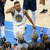 Golden State Warriors’ Stephen Curry celebrates a basket and a Dallas Mavericks’ foul in 1st quarter during Game 3 of NBA Western Conference Finals at American Airlines Center in Dallas, Texas, on Sunday, May 22, 2022.