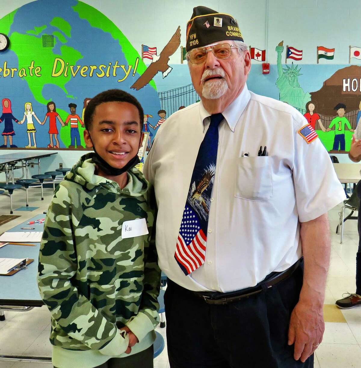 Kai Houghton with pen pal Bill Savastano of Branford VFW Post 12106 at a recent Pen Pal Project event at West Woods School in Hamden.
