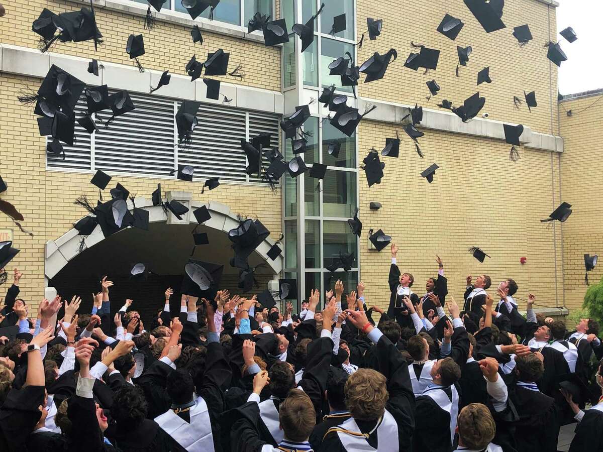 Xavier High School graduated 182 on Saturday at its 56th commencement exercises. At the conclusion of ceremonies, class members threw their mortar boards in the air.