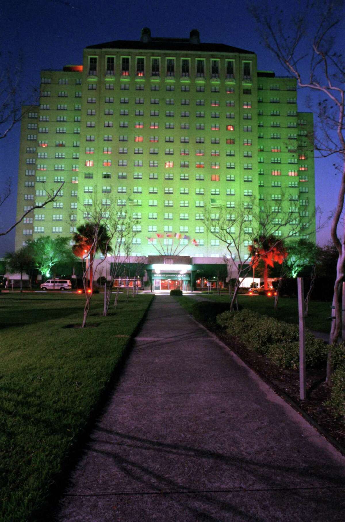 At night, the Shamrock Hotel/Shamrock Hilton was bathed in green light. It’s shown here at dusk in 1986.