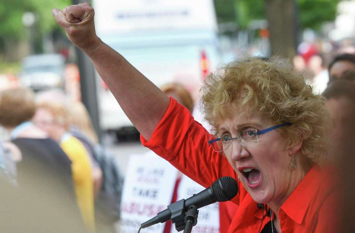 FILE - In this Tuesday, June 11, 2019 file photo, Christa Brown, of Denver, Colo., speaks during a rally in Birmingham, Ala., outside the Southern Baptist Convention's annual meeting. Brown, an author and retired attorney, says she was abused by a Southern Baptist minister as a child. After reading an investigative report released by the SBC on Sunday, May 22, 2022, Brown said it “fundamentally confirms what Southern Baptist clergy sex abuse survivors have been saying for decades. ... I view this investigative report as a beginning, not an end. The work will continue." (AP Photo/Julie Bennett)