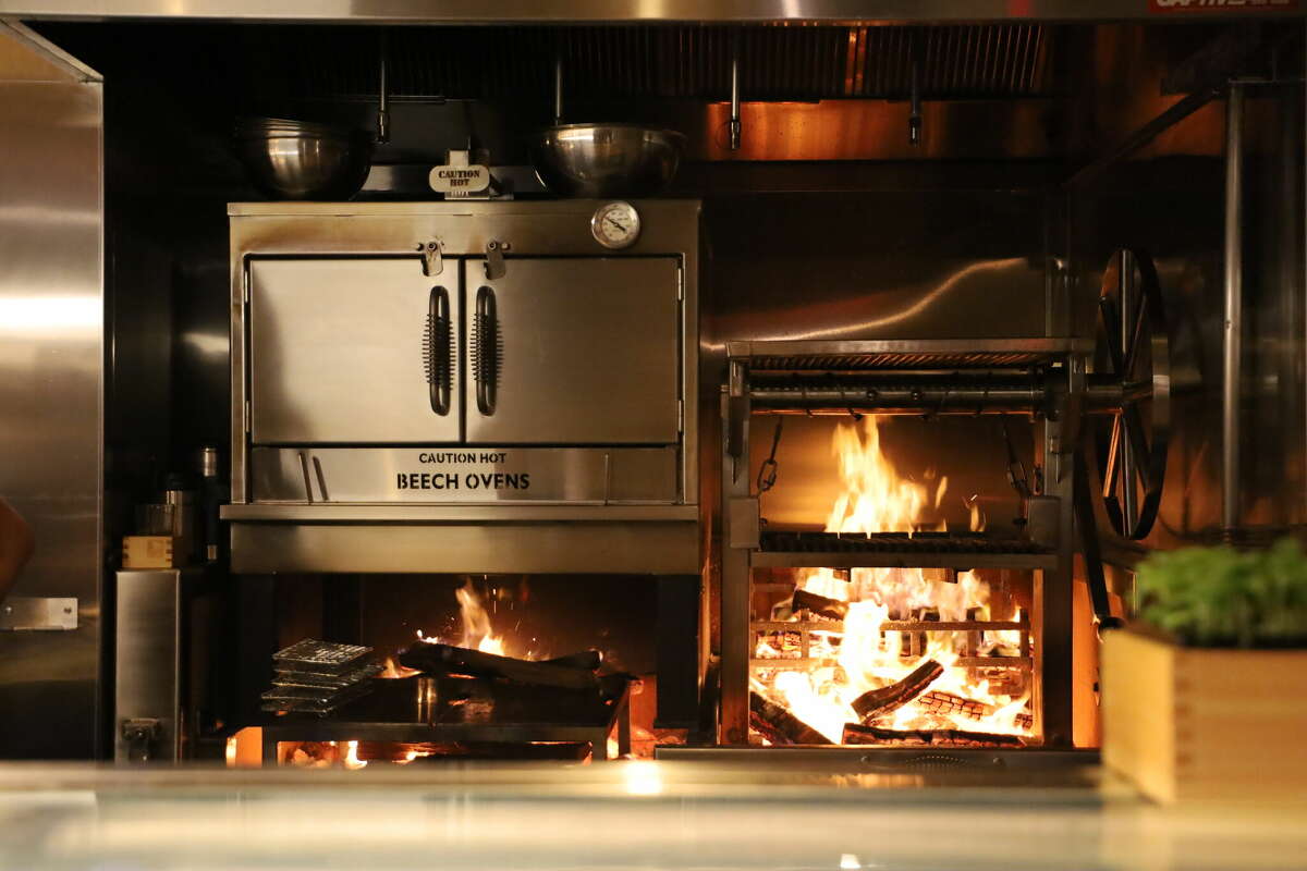 The hearth in the kitchen is what sets Uchiko apart.