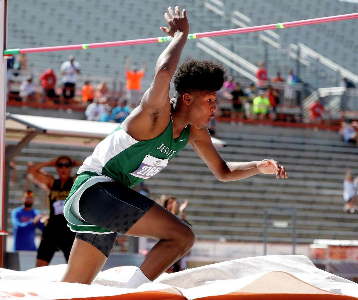 Jace Posey of Strake Jesuit reacts after clearing a jump of 7 feet, 4.25 inches to set a new record in the Class 6A boys high jump during the UIL State Track & Field Championships at Mike a Myers Stadium, Saturday, May 14, 2022, in Austin.