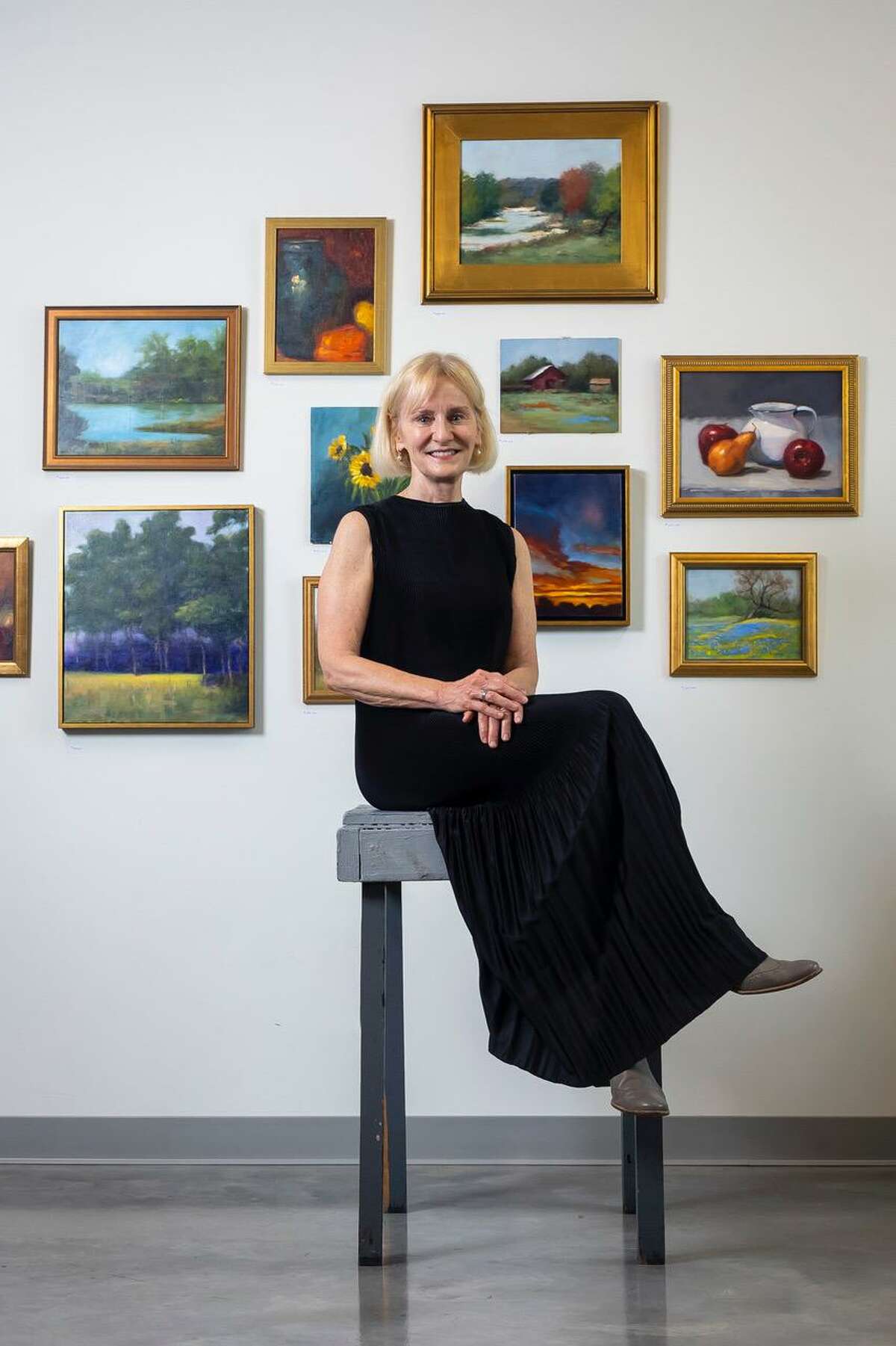 Houston artist Helene Robinson works primarily in oil and her subject matter ranges from realistic still life paintings to impressionistic landscapes. She is seen in her studio at Art Square Studios on Almeda with some of her recent works.