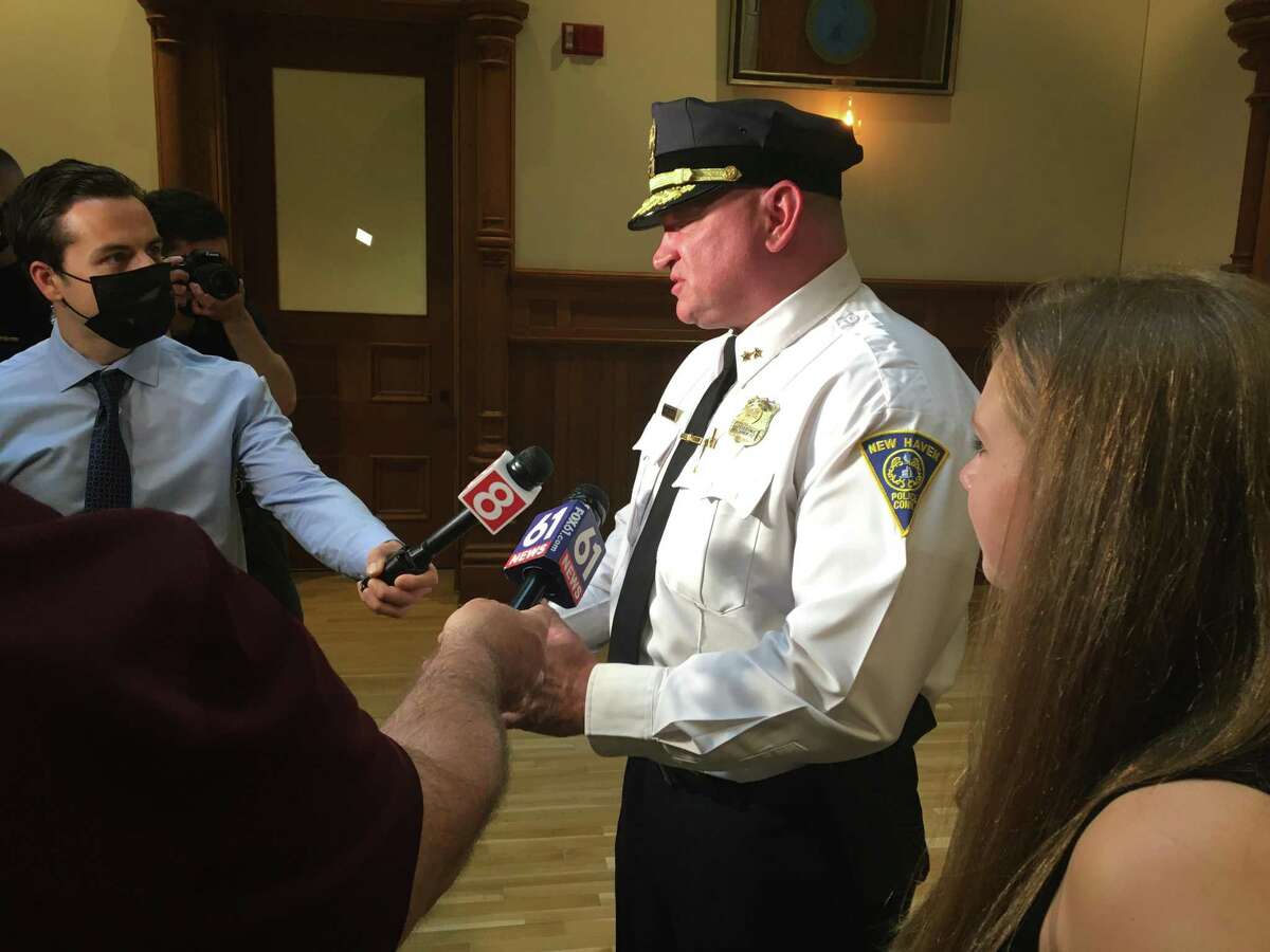 New Haven Assistant Police Chief Karl Jacobson speaks to the press in City Hall Monday joined by his daughter, Kelli Jacobson, right, after New Haven Mayor Justin Elicker introduced Jacobson as his nominee to be chief of police.