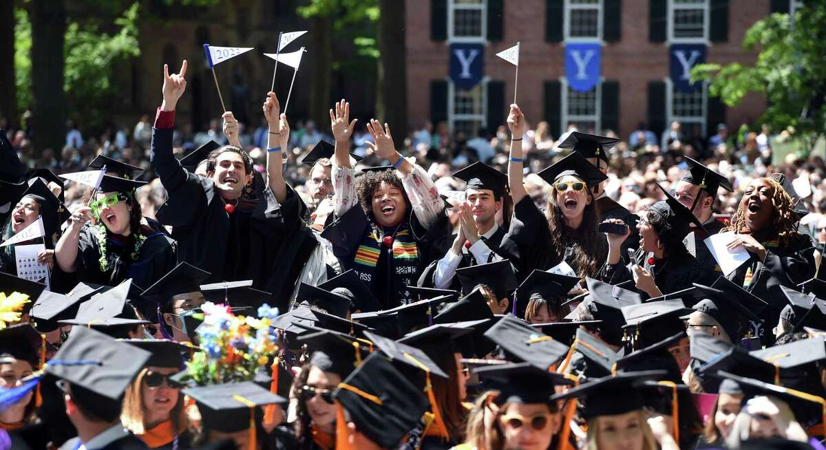 School of Drama graduates celebrate during the Yale University commencement on Old Campus in New Haven Monday.