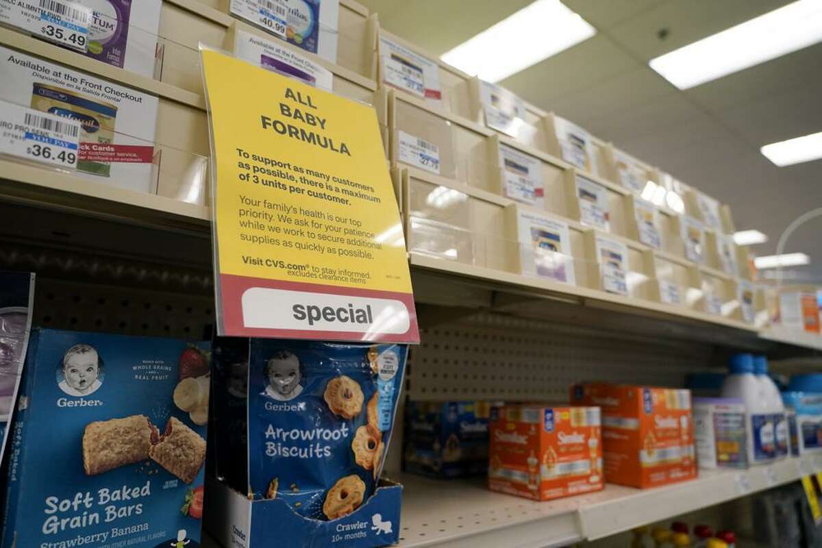 A sign is posted at a CVS pharmacy indicating a shortage in the availability of baby food Tuesday, May 10, 2022, in Charlotte, N.C. Parents in much of the U.S. are scrambling to find baby formula after a combination of supply disruptions and safety recalls have swept many of the leading brands from store shelves.