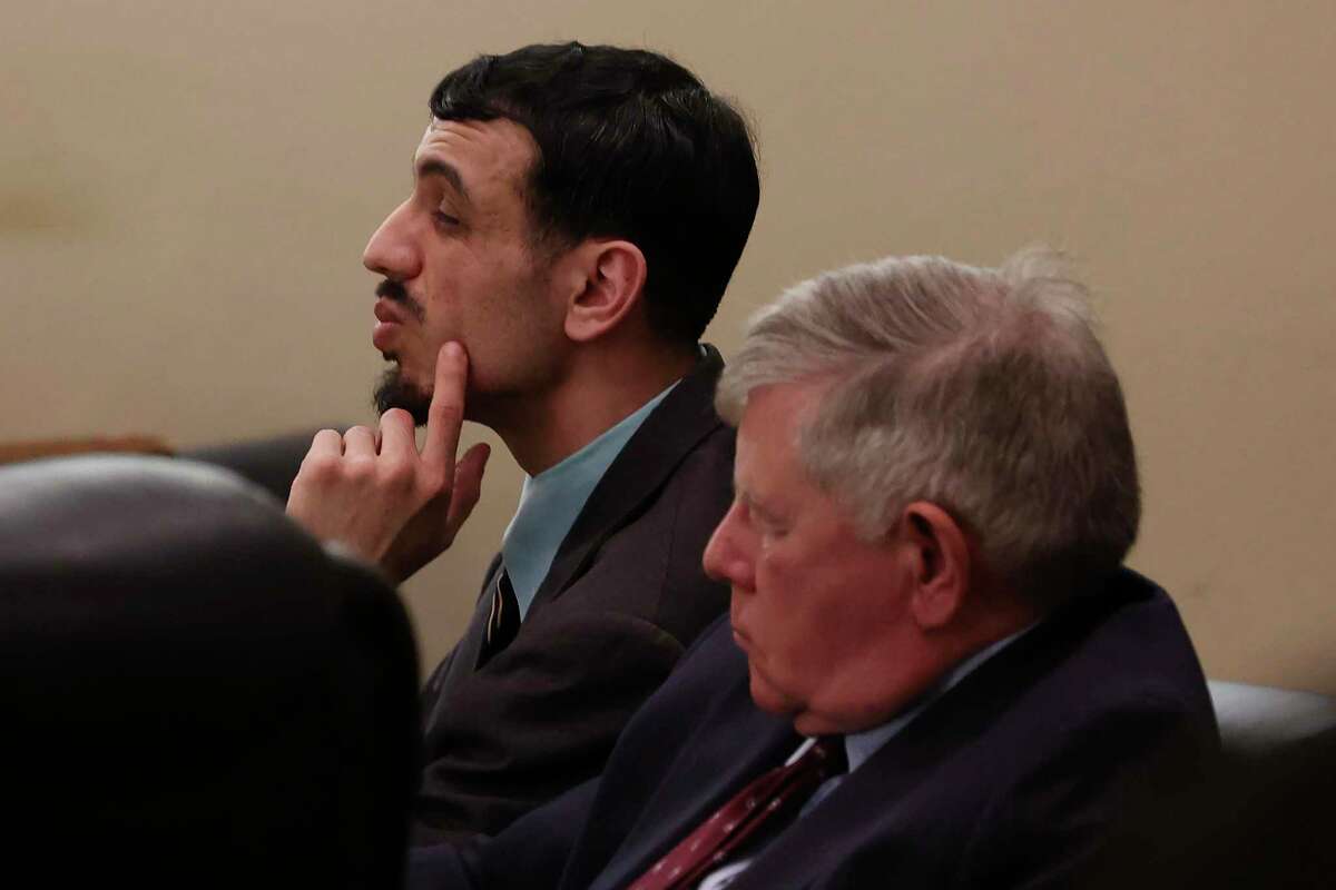 Eduardo Torres sits with his defense attorney John Economidy during closing arguments Monday in his capital murder trial. A jury found Torres not guilty in the death of Nathan Valdez, 21, in a robbery in 2016 in which Torres’ brother pulled the trigger.