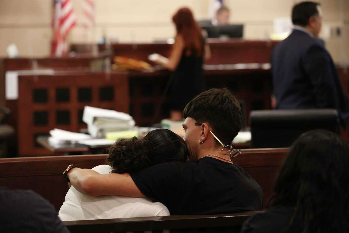 The victim’s family members react during closing arguments Monday in the capital murder trial of Eduardo Torres. A jury found Torres not guilty in the death of Nathan Valdez, 21, in a robbery in 2016 in which Torres’ brother pulled the trigger.