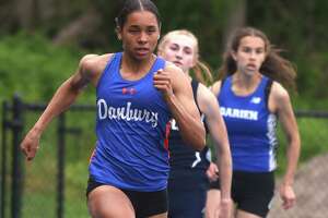 Smith’s record effort leads Danbury girls to FCIAC track title