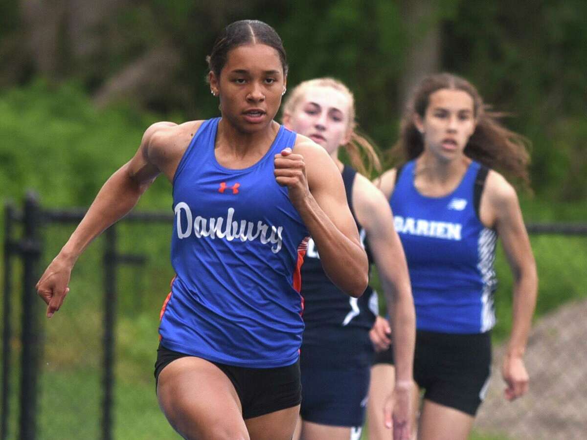 Danbury’s Alanna Smith set the pace in the 200-meter dash at the FCIAC girls outdoor track championships on Monday in Wilton.