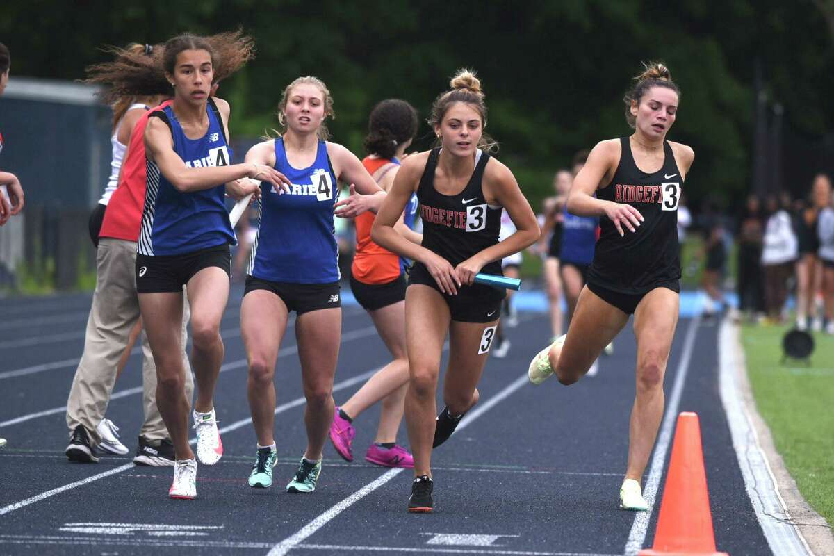 Smith’s record effort leads Danbury girls to FCIAC track title