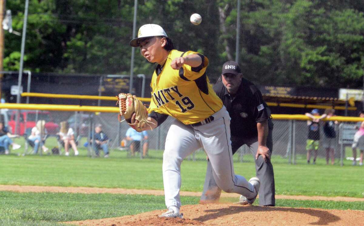Amity lefthander Marty Zhang delivers a pitch in the top of the first inning against Shelton on Monday.