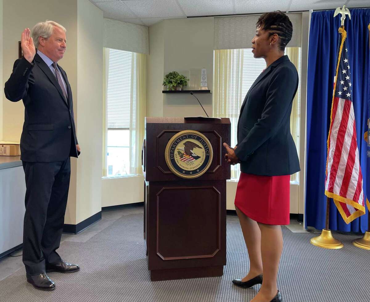 U.S. Attorney Vanessa Roberts Avery (right) swears in Alfred Pavlis as Connecticut’s first assistant U.S. Attorney Monday morning in New Haven.