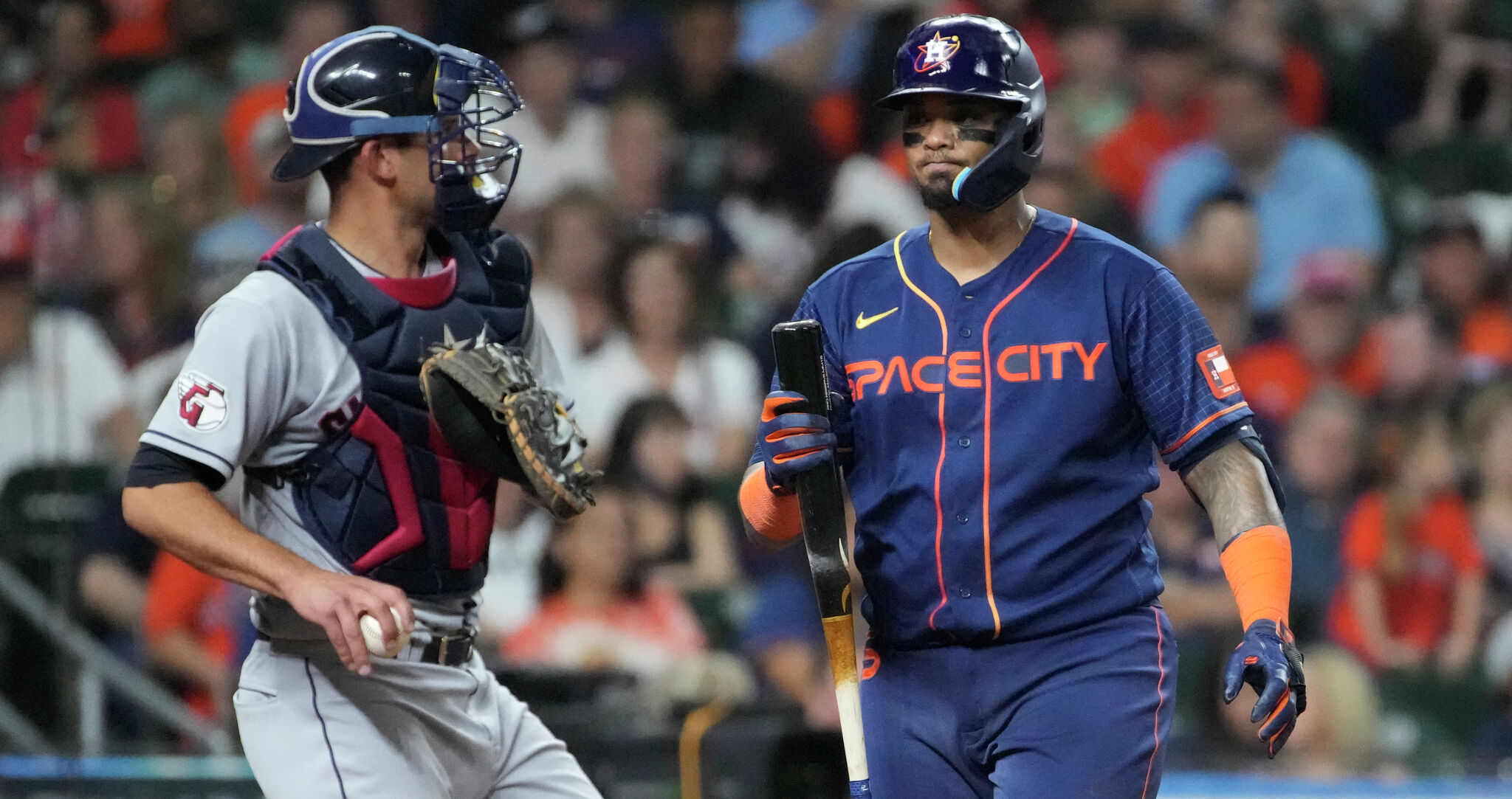 Steven Kwan takes a foul ball off the top of his head