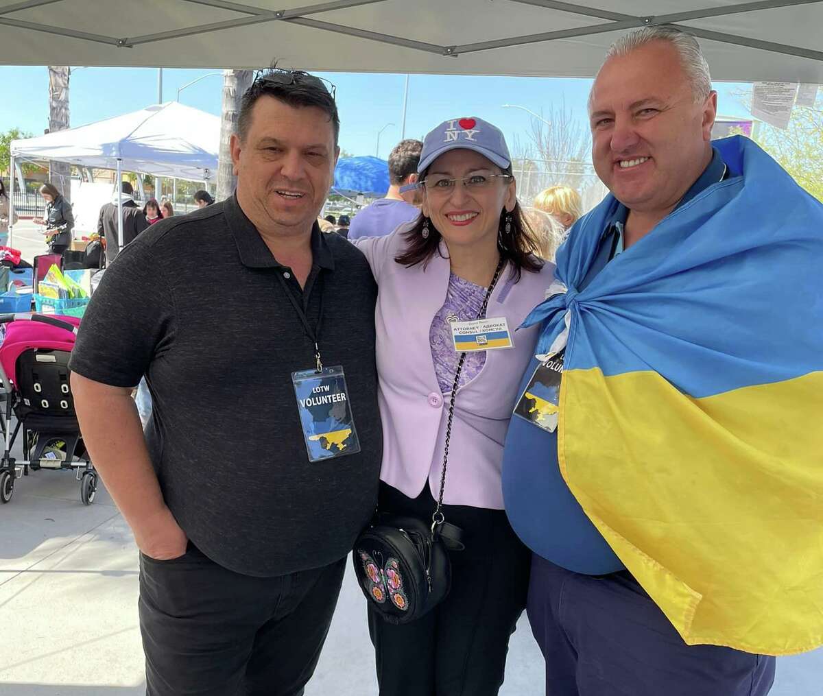 Connecticut immigration lawyer Dana Bucin, center, at refugee camp for Ukrainians in Mexico in April with two volunteers.