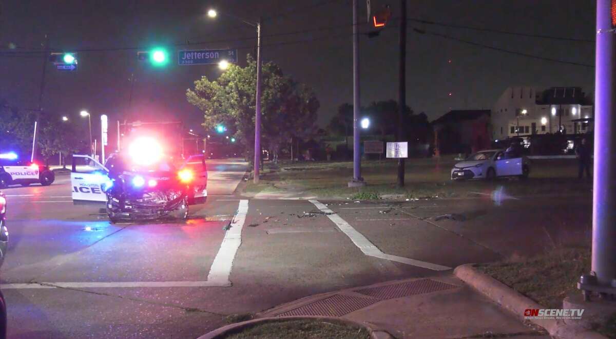 Houston police respond to an crash involving an HPD cruiser and another vehicle on May 23, 2022.