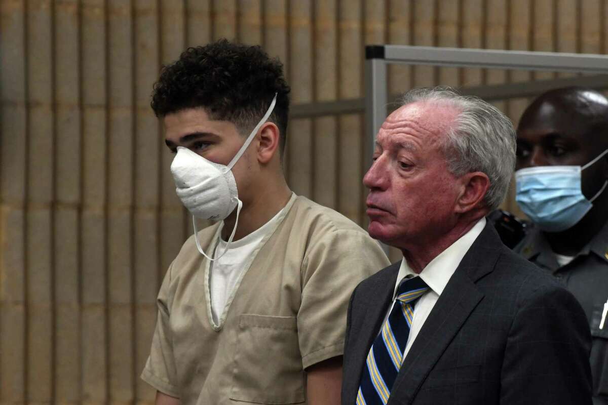 Raul Valle appears in Superior Court, in Milford, Conn. May 23, 2022. Valle is seen here with his defense attorney, Jake Donovan.