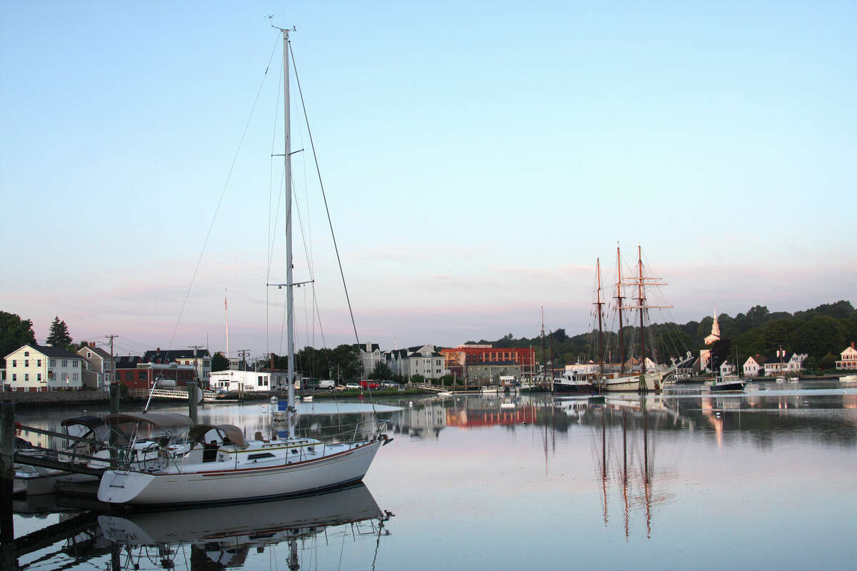 Mystic is a village in New London County, Connecticut, in the United States. Mystic is located within the towns of Groton and Stonington. Mystic is a major New England tourist destination. The village is known for its maritime heritage, historic ship-captain's homes, excellent dining and two immense casinos