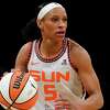 Connecticut Sun guard Jasmine Thomas (5) dribbles up the court in the second half during a WNBA basketball game against the New York Liberty, Tuesday, May 17, 2022, in New York. (AP Photo/John Minchillo)