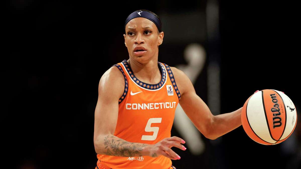 Connecticut Sun guard Jasmine Thomas look to pass against the New York Liberty on May 7.