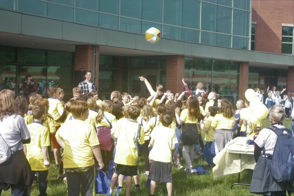 Third grade students from Manistee, Mason, Lake and Oceana counties keep a beach ball in the air Tuesday to get energized for the WSCC, CTE and Me Day at West Shore Community College's main campus.