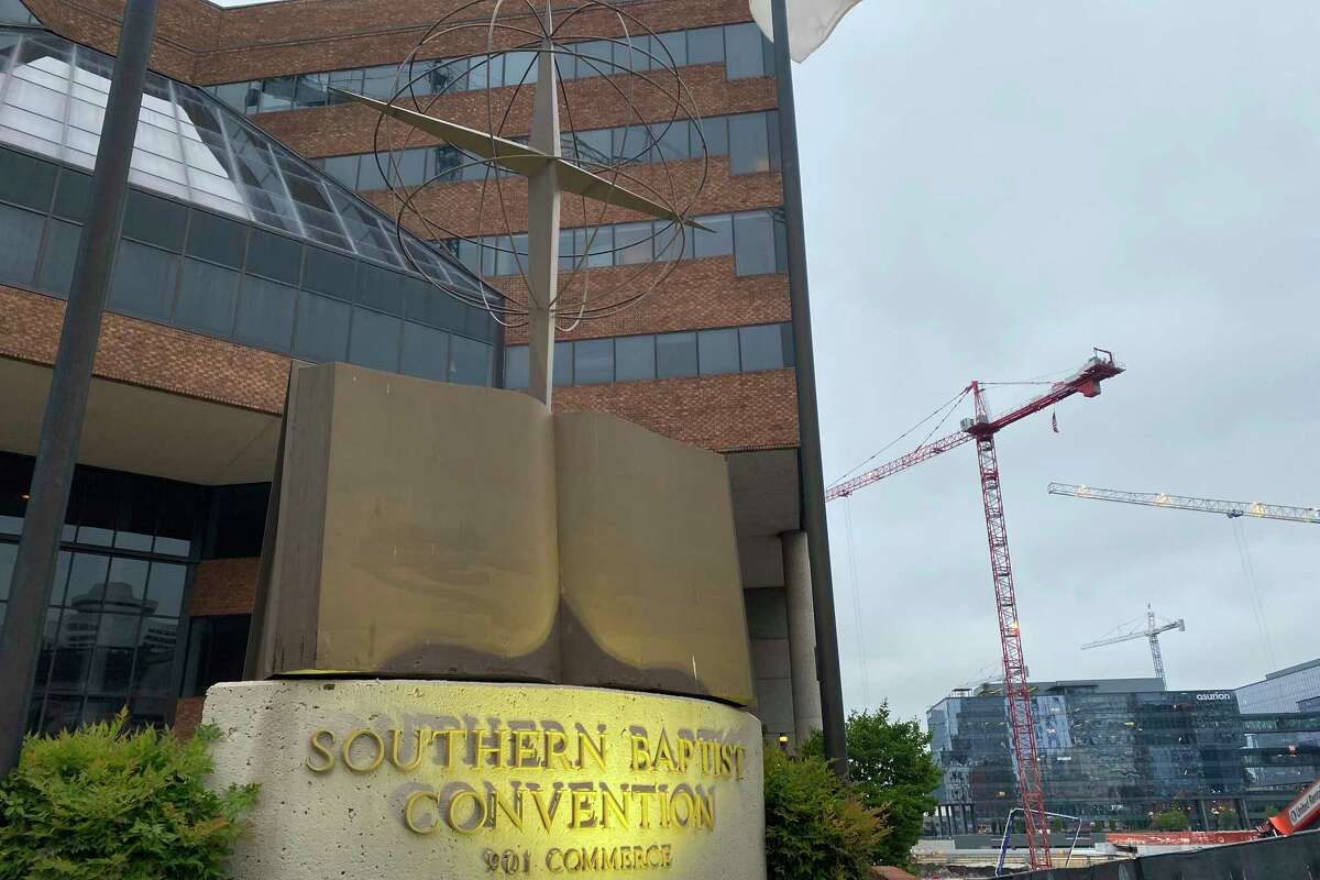 A cross and Bible sculpture stand outside the Southern Baptist Convention headquarters in Nashville, Tenn., on Tuesday, May 24, 2022. On Tuesday, top administrative leaders for the SBC, the largest Protestant denomination in America, said that they will release a secret list of hundreds of pastors and other church-affiliated personnel accused of sexual abuse.