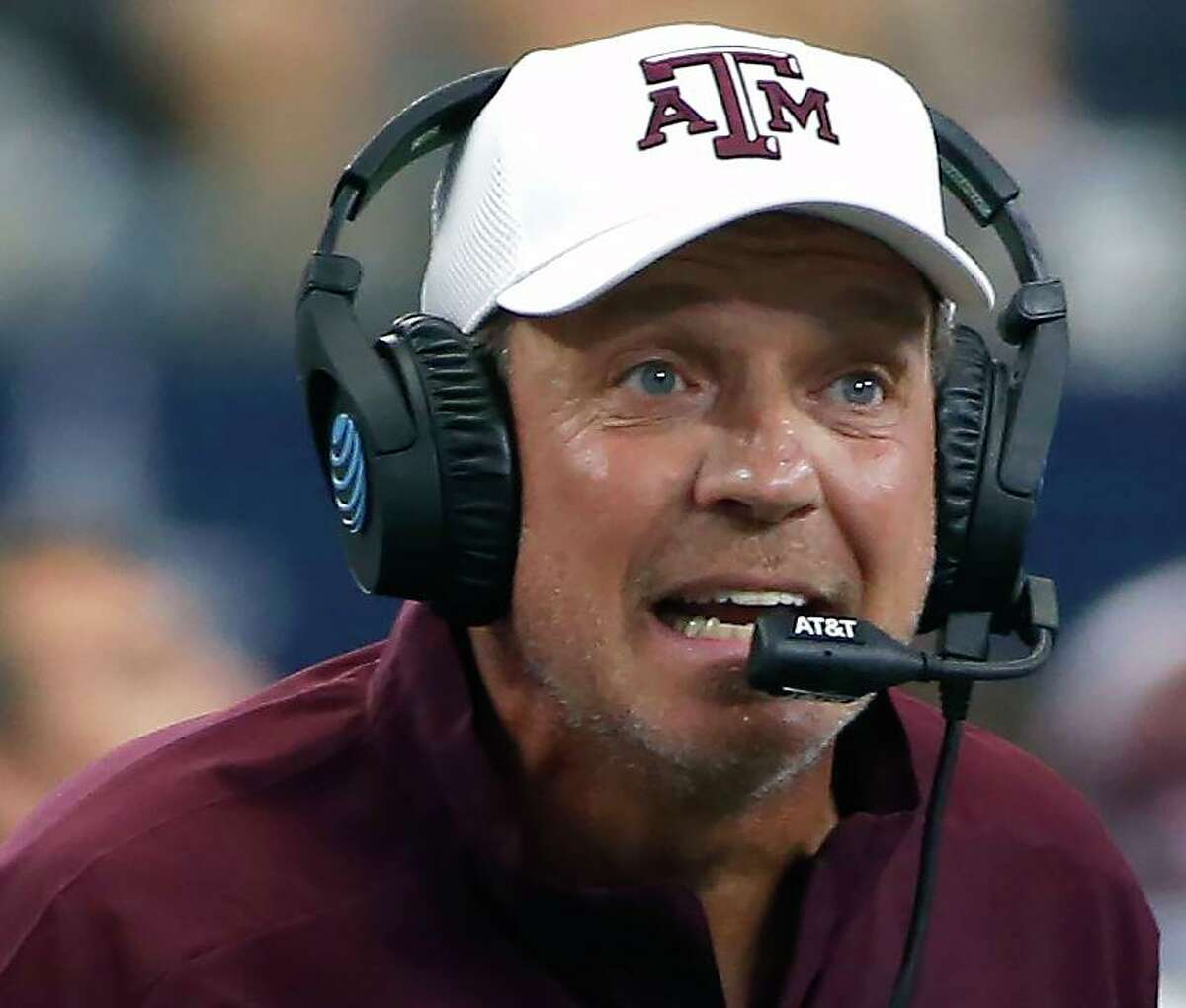 In this Sept. 28, 2019, file photo, Texas A&M head coach Jimbo Fisher talks to his team during the first half against Arkansas, in Arlington. The Southeastern Conference spring meetings will be held in person for the first time since 2019 in a little less than two weeks. It is unlikely two of the league’s superstar coaches will be chumming around Destin, Fla., together.
