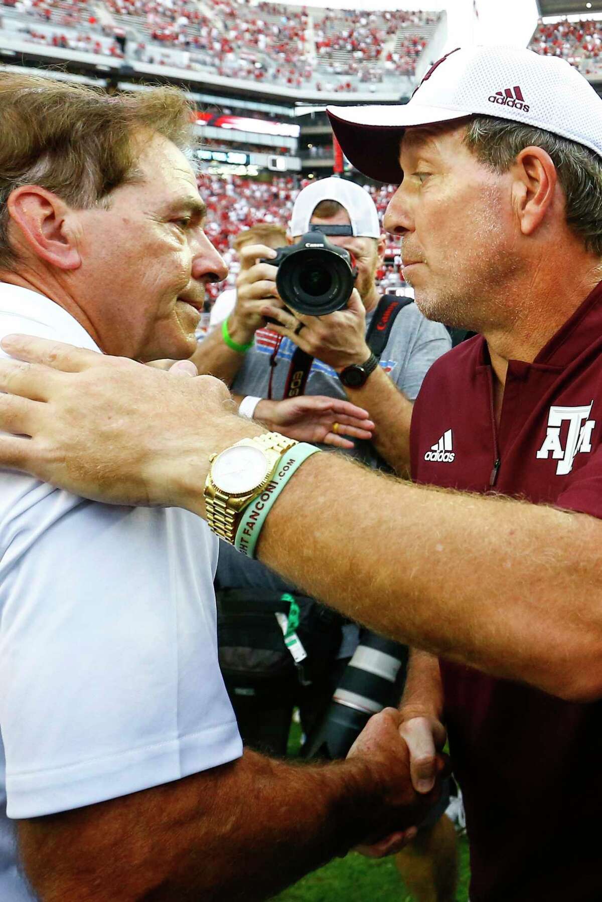 Alabama head coach Nick Saban shakes hands with Texas A&M head coach Jimbo Fisher after a game on Saturday, Sept. 22, 2018, in Tuscaloosa, Ala. Fisher called Nick Saban a “narcissist” after he made “despicable” comments about the Aggies using name, image and likeness deals to land their top-ranked recruiting classes. Saban called out A&M for “buying” players.