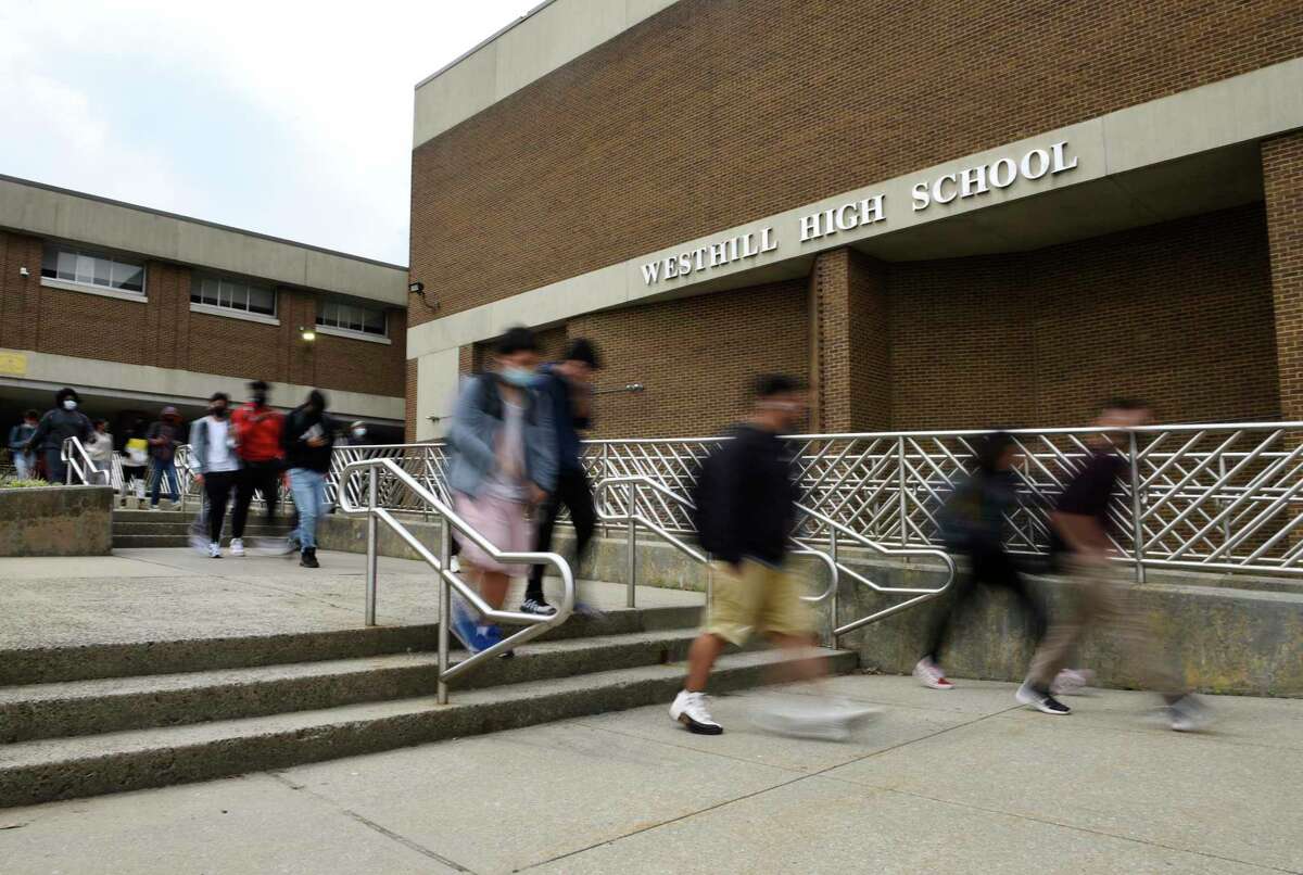 Students returning at Westhill High School in Stamford, Conn. School officials said Westhill is closed Wednesday, Aug. 31, 2022, following a water main break.