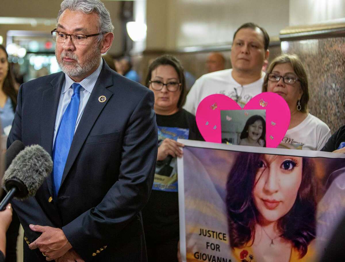 District Attorney Joe D. Gonzales, with relatives of murder victim Giovanna Barrera, speaks outside the courtoom Tuesday in the Cadena-Reeves Justice Center where her killer Daniel Calvillo, pleaded guilty.