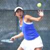 Darien No. 1 singles player Lauren Zhang hits a return during the FCIAC girls tennis championship against Staples on Tuesday, May 24, 2022 in Wilton, Conn.