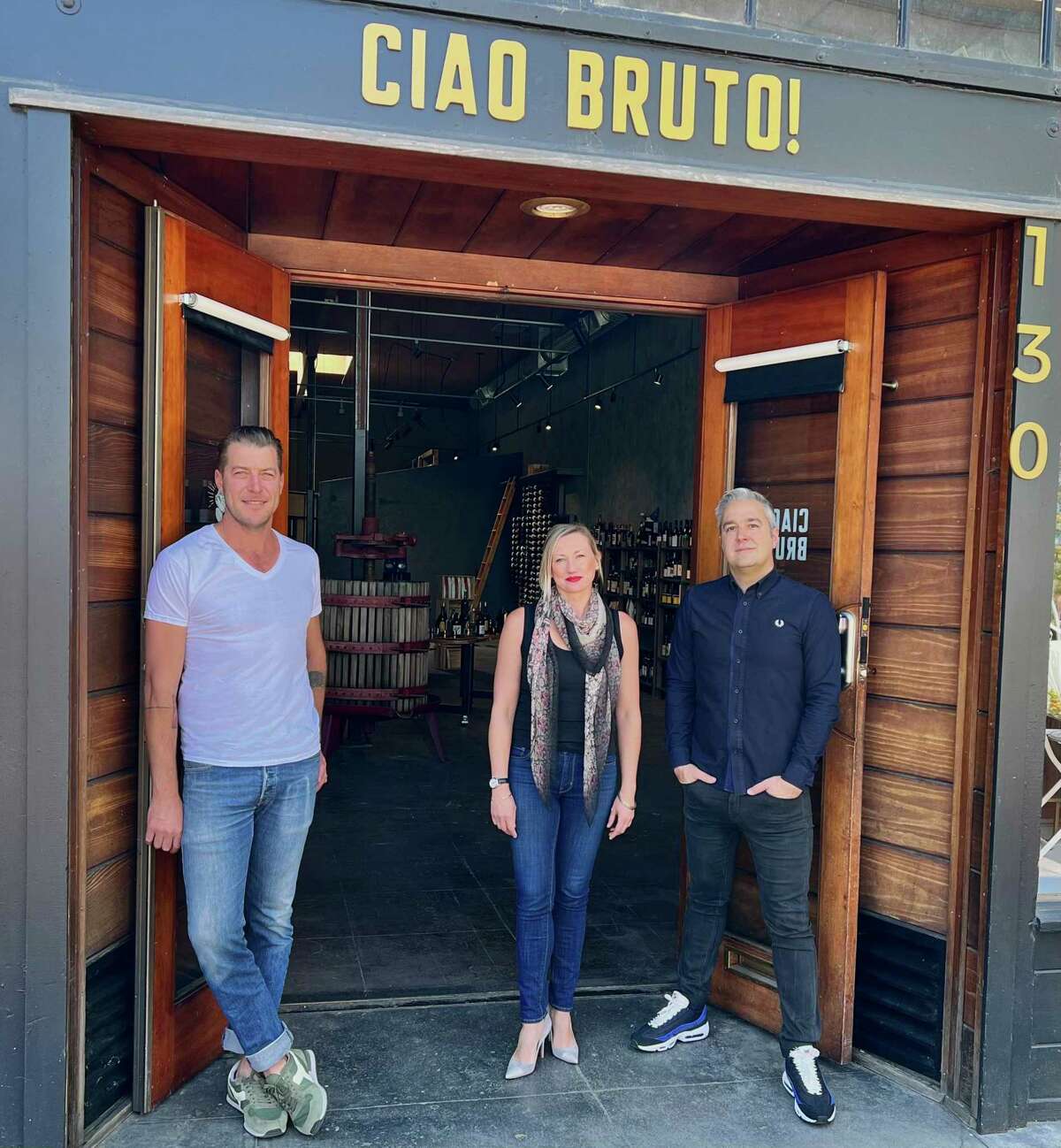 Sam Bilbro (left) with Courtney Humiston and Thomas DeBiase outside Ciao Bruto, the new Italian specialty food and wine shop they’re running in downtown Healdsburg.