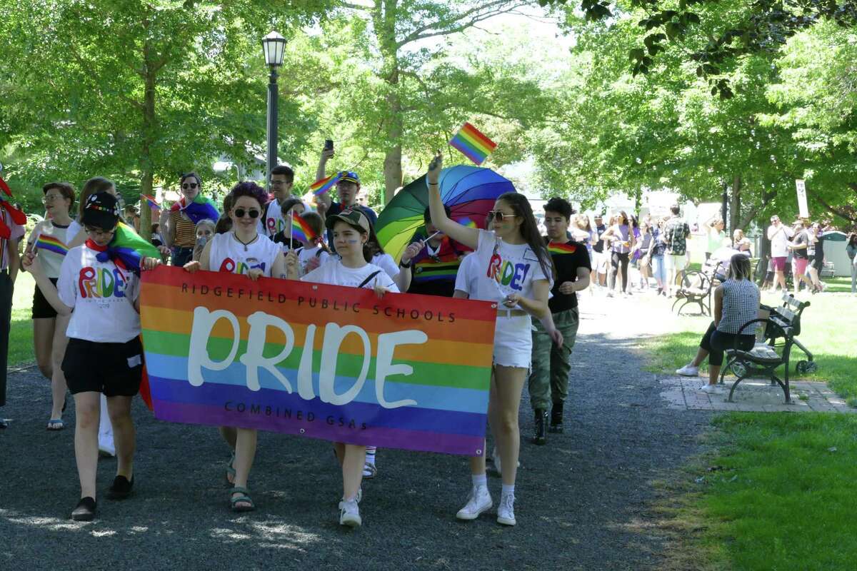 Students from Ridgefield's middle school and high school gay-straight alliances led a parade through ballard park on the town's first pride day, Saturday June 15.