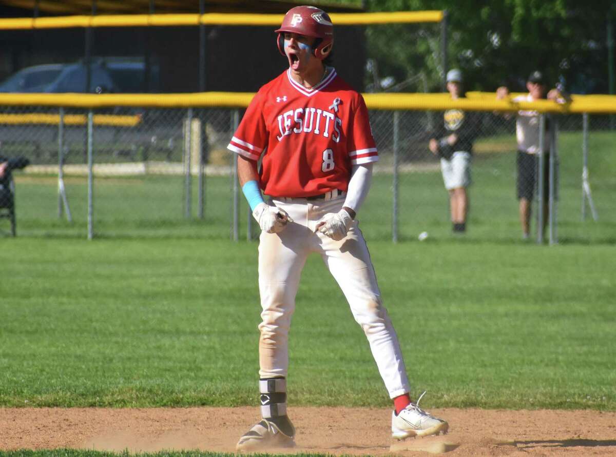 Fairfield Prep's Joe D'Elia celebrates after hitting an RBI double during the SCC baseball semifinals gam,e between Amity and Fairfield Prep, at Amity High, Woodbridge on Tuesday, May 24, 2022.