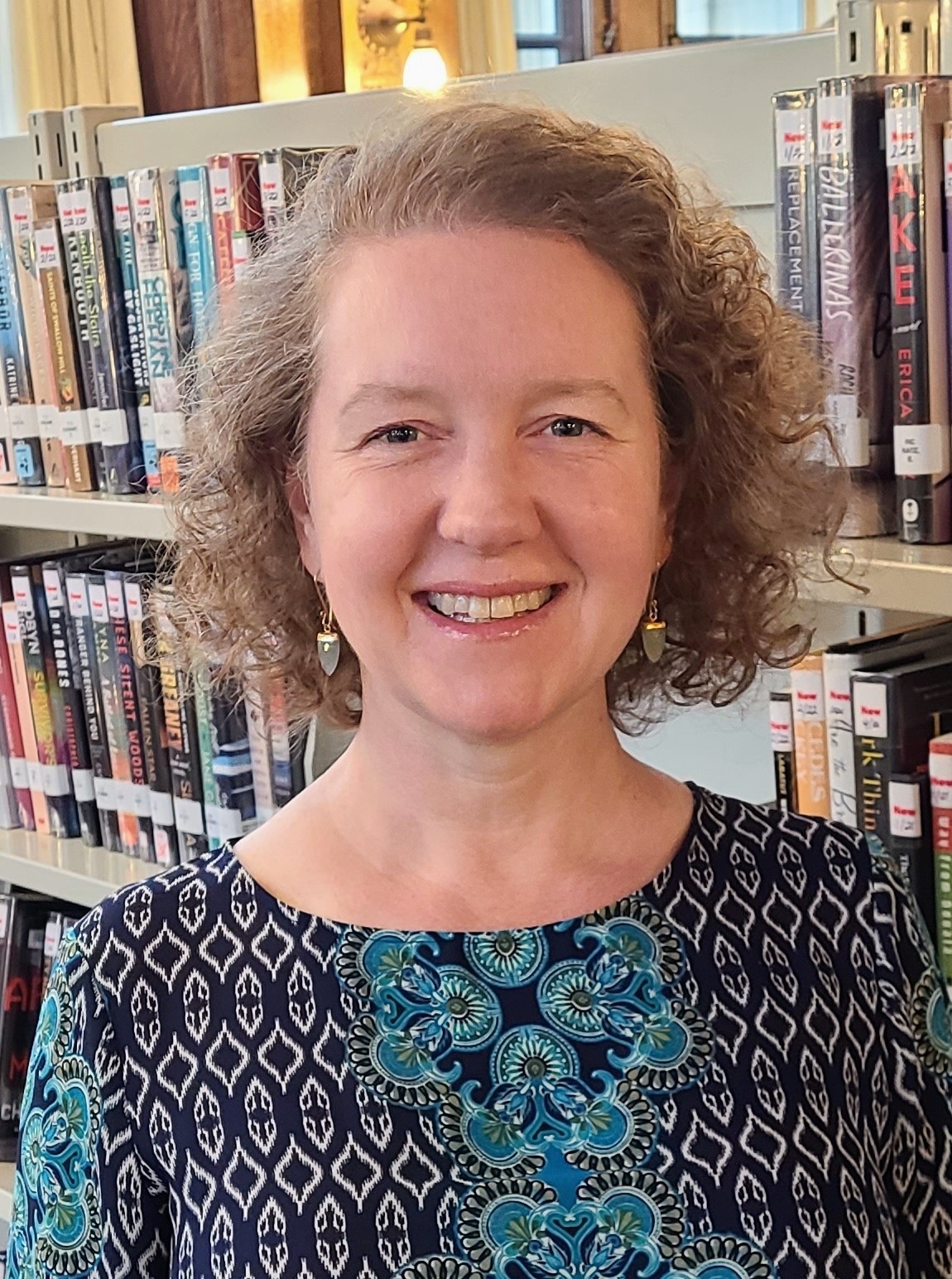 Mass. woman named new Albany library leader