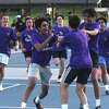 Westhill rushes the court after beating Staples to win the FCIAC boys tennis championship on Tuesday, May 24, 2022 in Wilton, Conn.