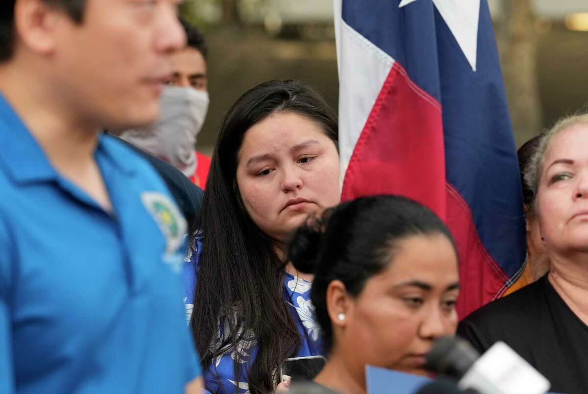 Susanna Lujano cries during a press conference calling for gun control measures after the mass shooting at an elementary school in Uvalde, Texas, on Tuesday, May 24, 2022, at the George Thomas “Mickey” Leland Federal Building in Houston.