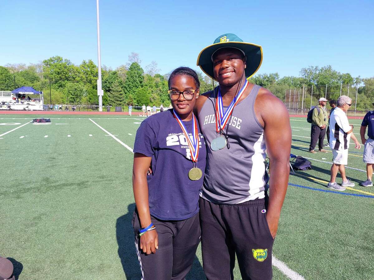 Olivia O’Connor of Hillhouse, left, won the girls shot put and discus and Gary Moore Jr. of Hillhouse won the discus, shot put and javelin at the SCC Outdoor Track Champioships on Tuesday.