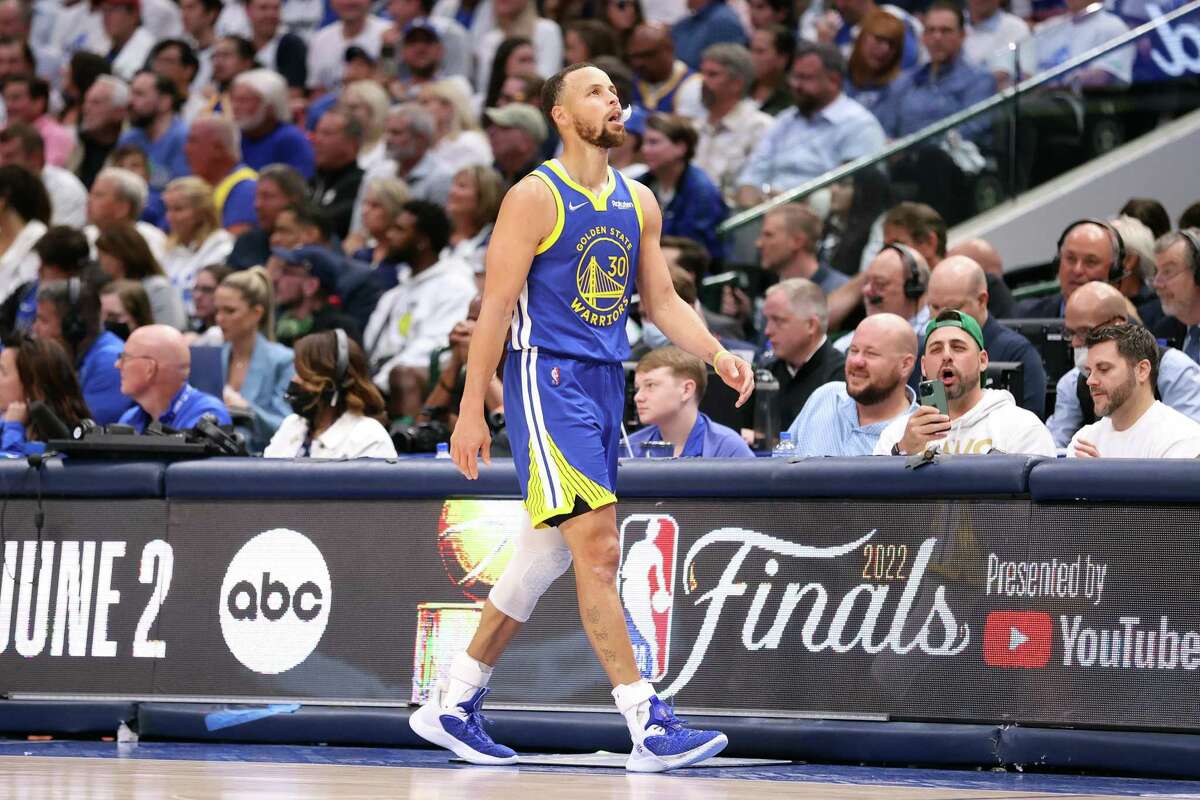 Golden State Warriors’ Stephen Curry walks off court in 3rd quarter against Dallas Mavericks during Game 4 of NBA Western Conference Finals at American Airlines Center in Dallas, Texas, on Tuesday, May 24, 2022.