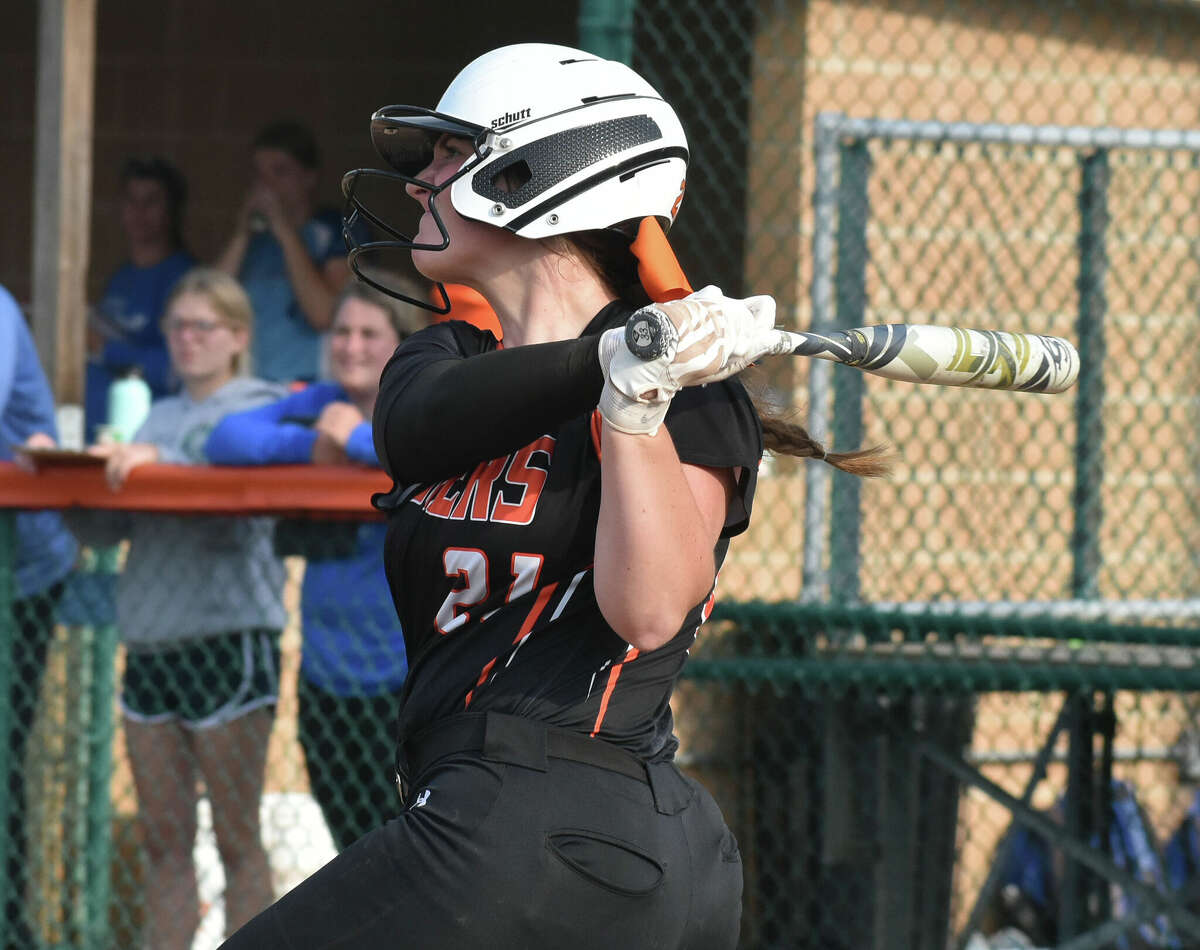 Edwardsville's Lexie Griffin rips a double against Quincy during the Class 4A Edwardsville Regional semifinals on Tuesday inside the District 7 Sports Complex.