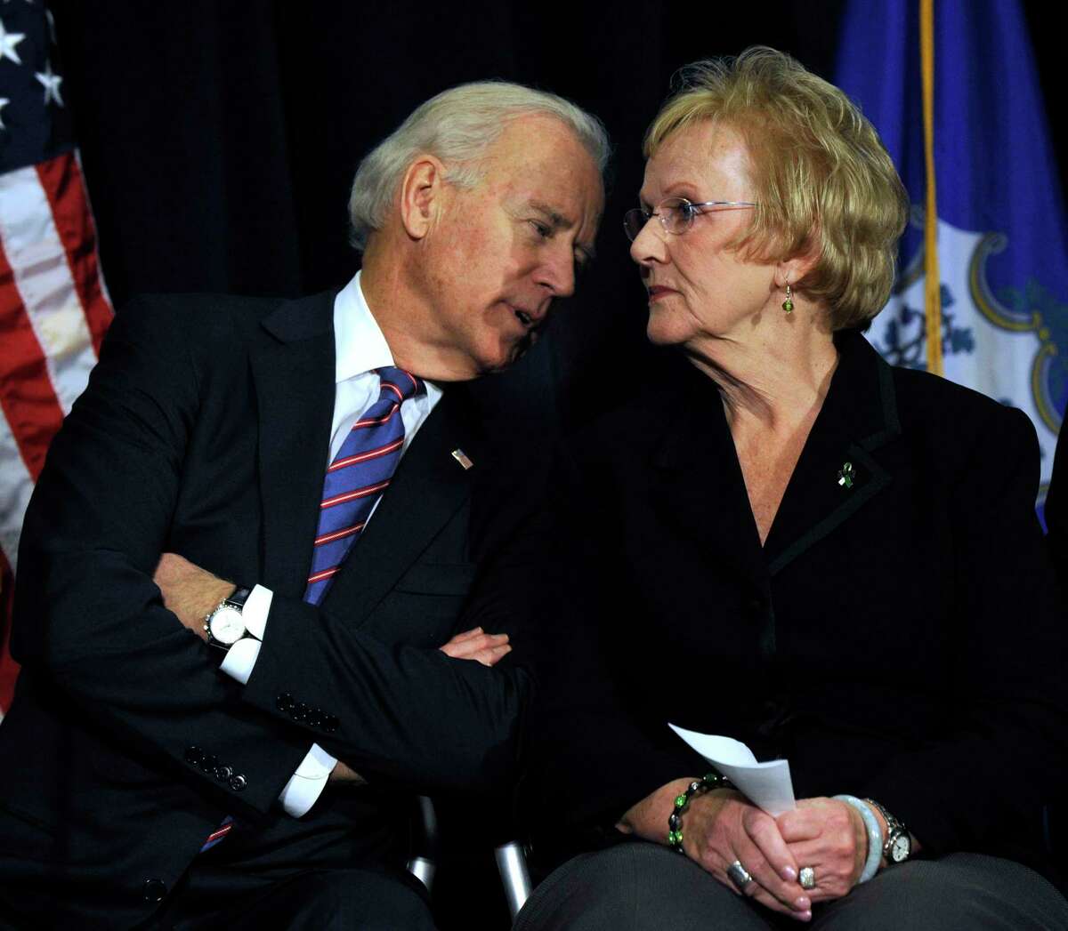Then-Vice President Joe Biden has a word with Newtown First Selectman Pat Llodra before speaking at a conference on gun violence at Western Connecticut State University in Danbury, Conn., Thursday, Feb. 21, 2013.