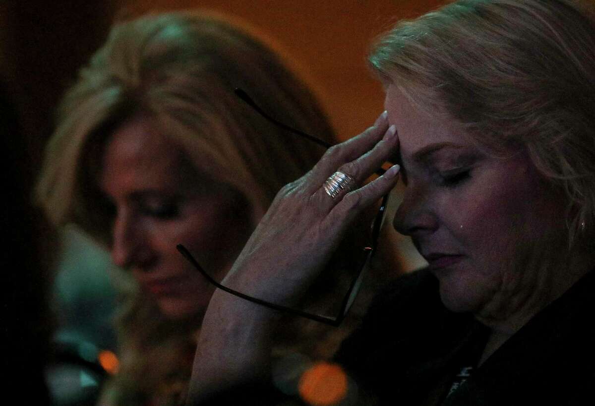 A tear falls down Kelly Rosati's cheek as she listens to Susan Codone tell her story of sexual abuse during the SBC Caring Well Conference on Thursday, Oct. 3, 2019, in Grapevine.