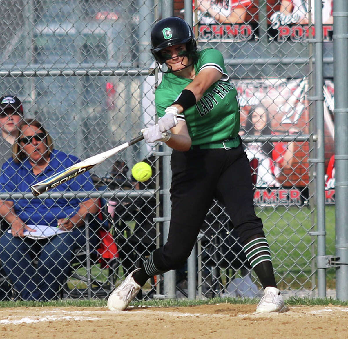 Carrollton's Paige Henson swings at a pitch against Marissa on Tuesday in a semifinal at the Marissa Class 1A Sectional.